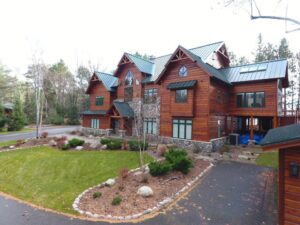 View of house from high up, driveway and exterior
